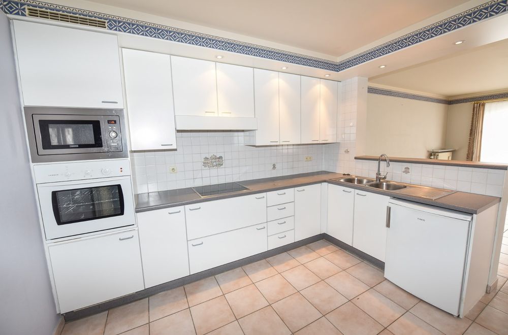Vastgoedfoto van Ruim appartement met lift, garage en terras TE KOOP in Zulte - 2 slaapkamers