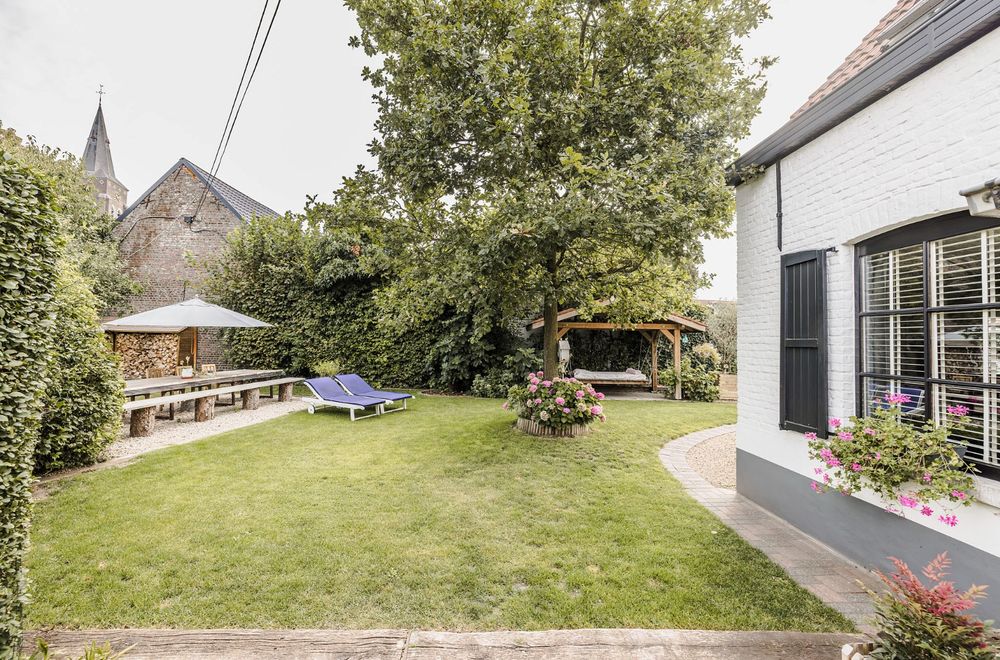 Vastgoedfoto van Volledig gerenoveerde, charmante woning in landelijke stijl te Olsene! 
